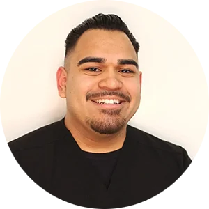 Professional portrait of Eric Corrales, the dedicated Office Manager ensuring a smooth and welcoming patient experience at Pure Cypress Dentist