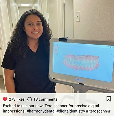 Friendly Pure Cypress Dentist team member smiling next to our advanced iTero 3D digital scanner, used for comfortable, goop-free impressions